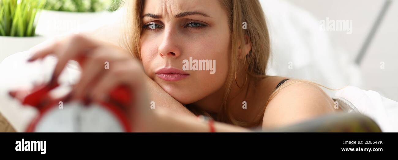 Exhausted female having headache after drinking wine Stock Photo Alamy