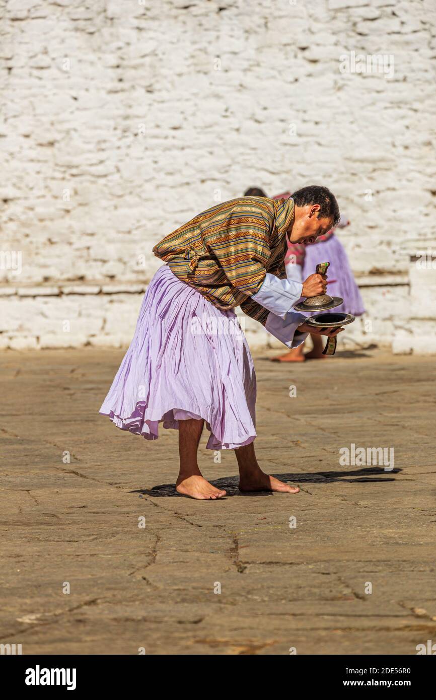 TRONGSA, BHUTAN - JANUARY 6, 2017: Monk rehearsing for the Trongsa tsechu Stock Photo