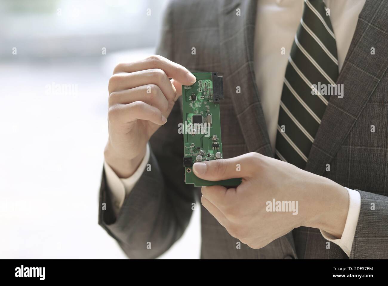Close up of businessman holding main board Stock Photo