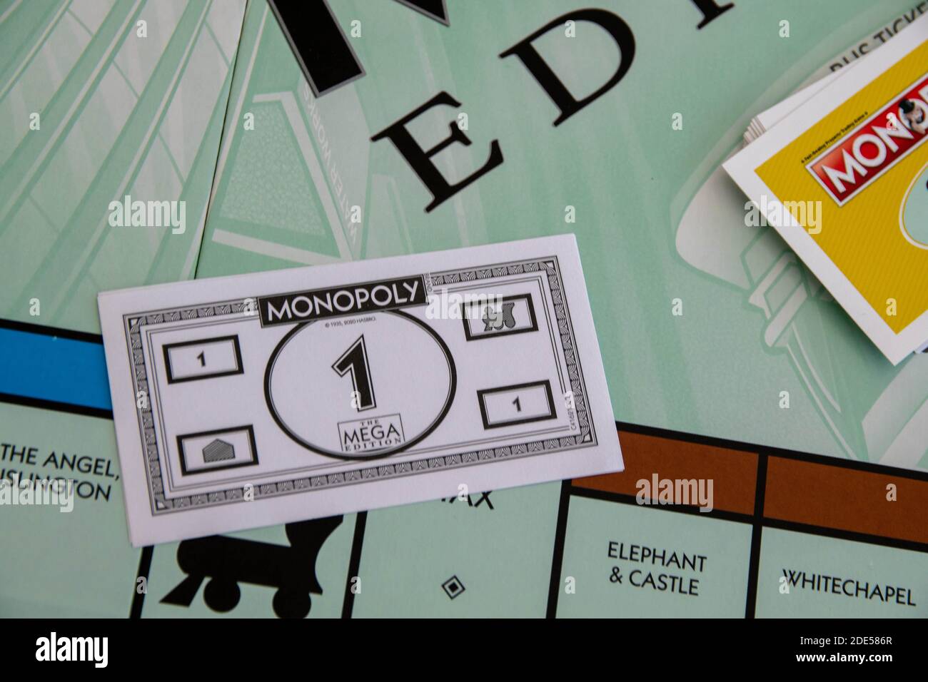 Newley released Mega Edition Monopoly. New twist on classic fast-dealing property trading board game (Hasbro games). Financial, banking, buying proper Stock Photo
