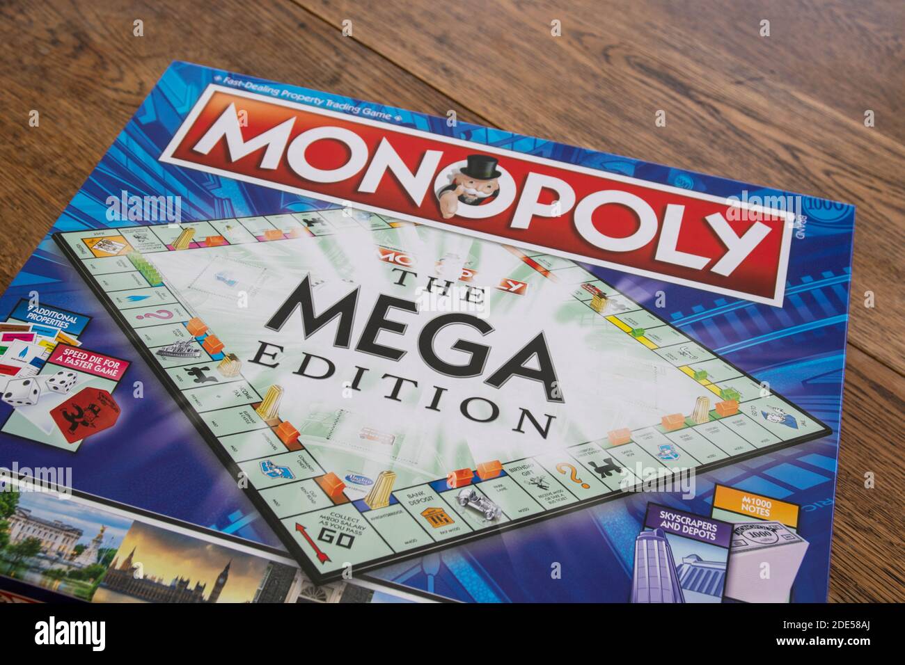 Durham, UK - 17th Nov 2020: Newley released Mega Edition Monopoly. New twist on classic fast-dealing property trading board game (Hasbro games). Finan Stock Photo