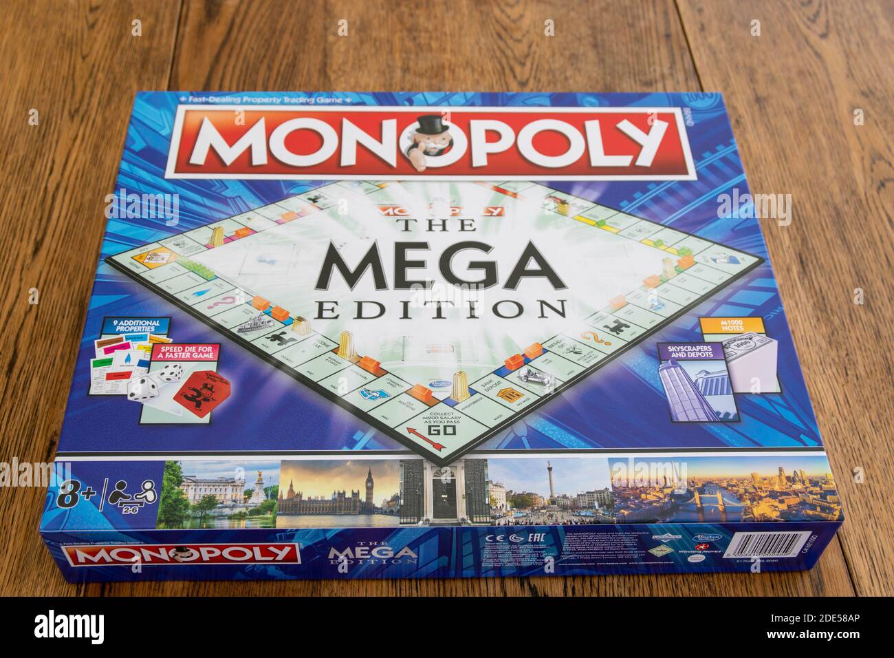 Durham, UK - 17th Nov 2020: Newley released Mega Edition Monopoly. New twist on classic fast-dealing property trading board game (Hasbro games). Finan Stock Photo