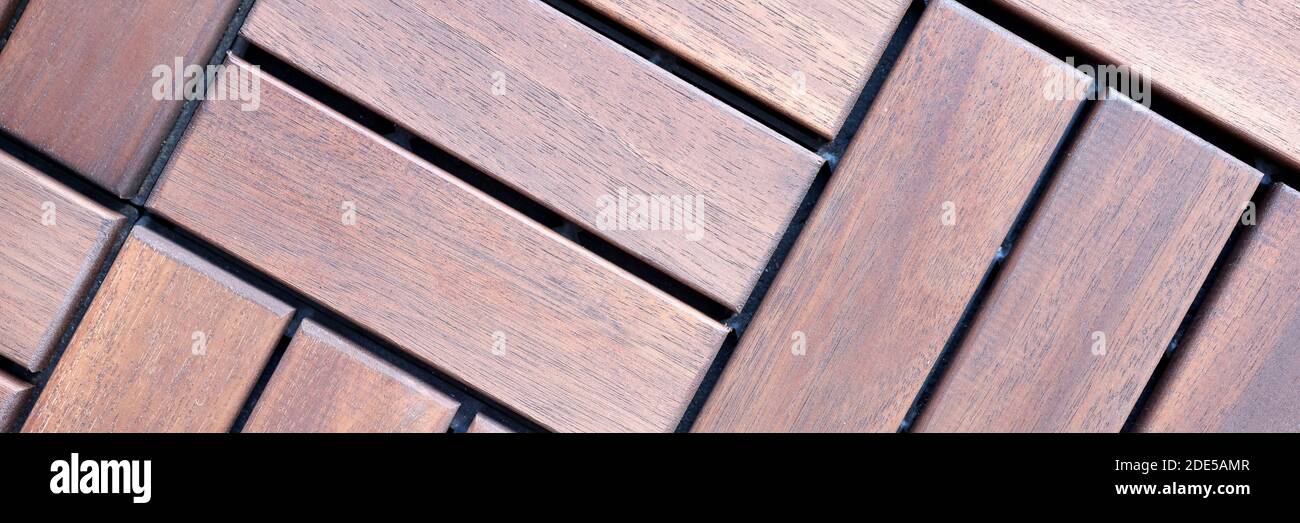 Brown wood floor tiles top view closeup background Stock Photo - Alamy