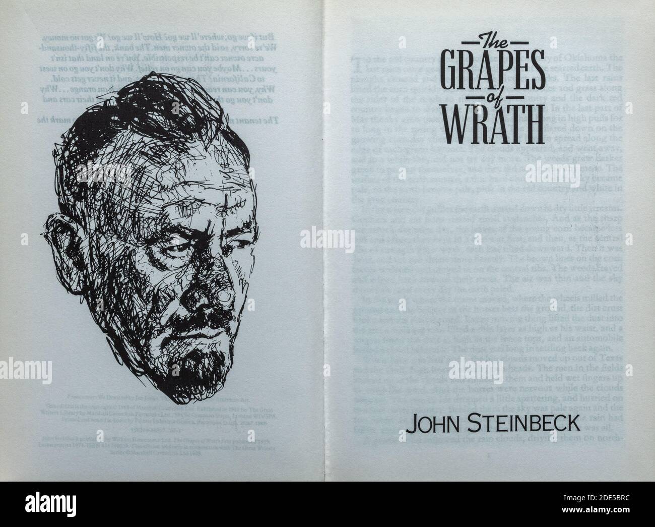 The Grapes of Wrath book - novel by John Steinbeck. Title page and drawing of the author. Stock Photo