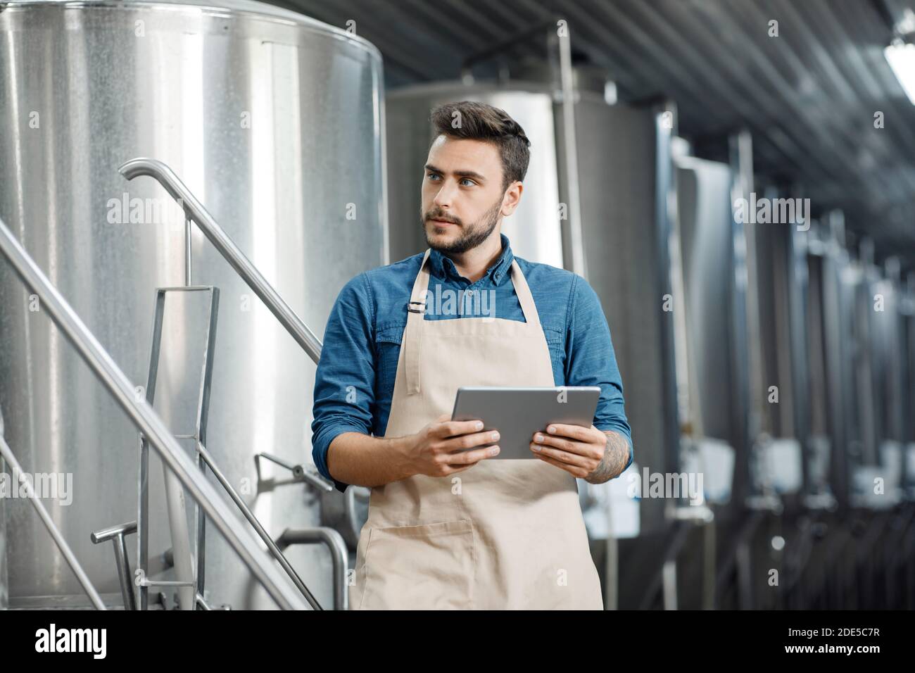 Production management with modern gadgets, startup and business control Stock Photo