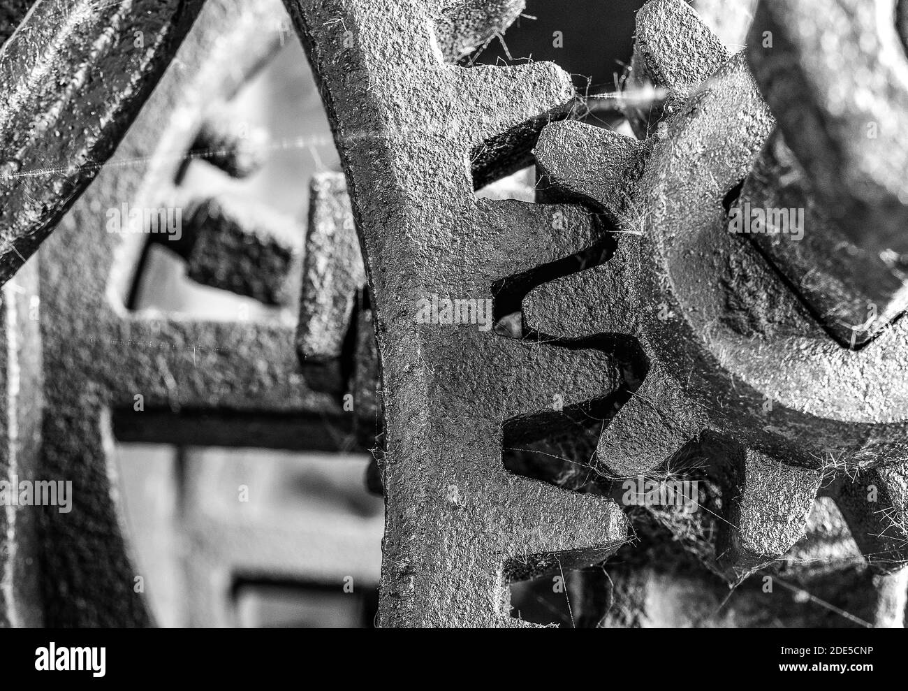 Rusty gear wheals, vintage chaff-cutter,  old agricultural machine. Polish countryside, finds in barns of fomer Eastern Prussia. Poland. Stock Photo
