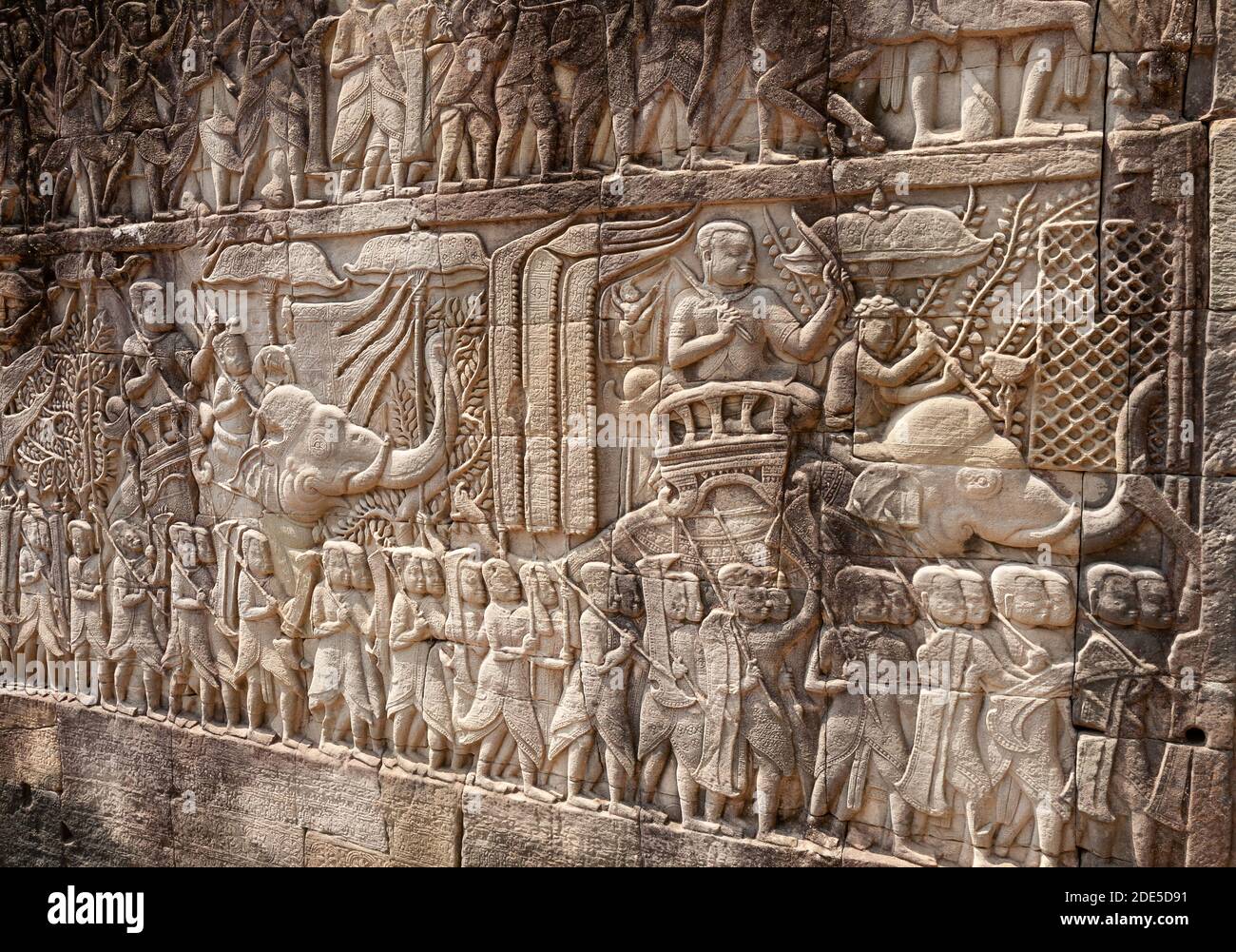 Basrelief sculpture of the Khmer army of warriors and elephants going