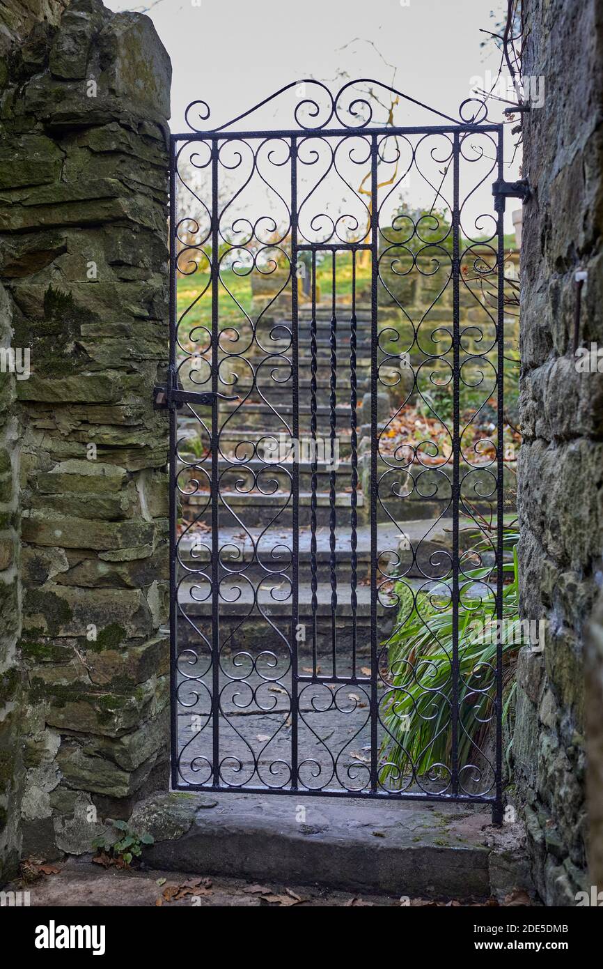 Newly sand blasted and painted wrought iron gates at Yorkshire dales smallholding cottage Stock Photo