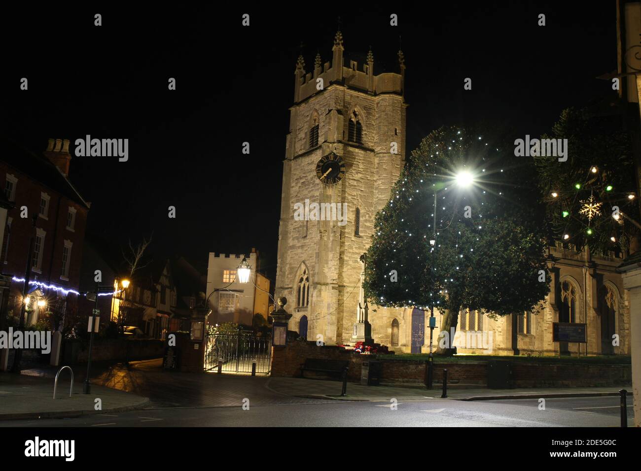 St Nicholas Church and Tower, in Shakespeare Country, Alcester, Warwickshire UK. At night with Christmas Lights. Stock Photo