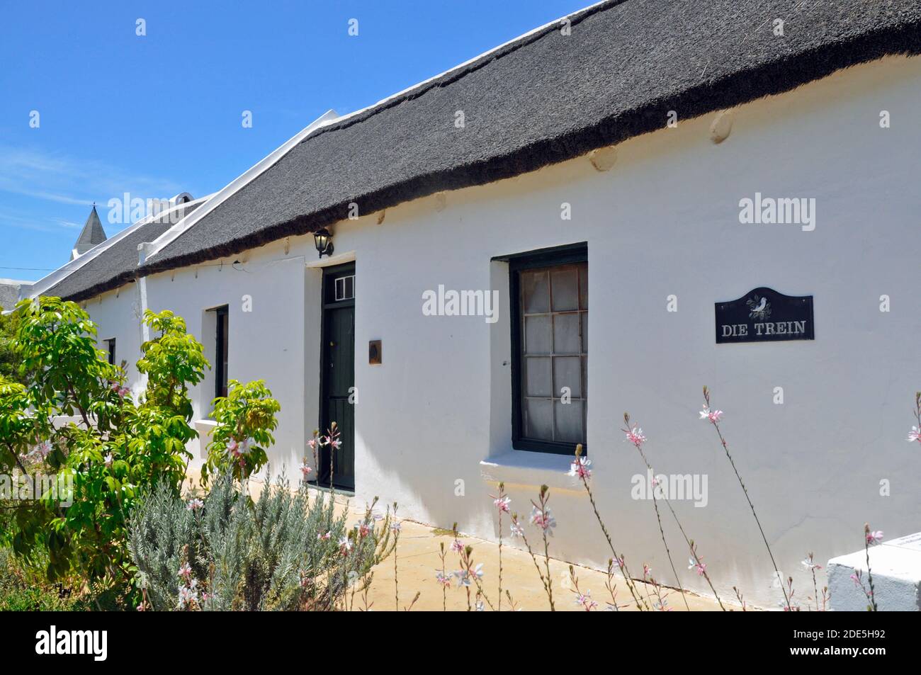 'Die Trein', one of the oldest houses in the charming village of McGregor and typical of its traditional, thatched 19th century architecture. Stock Photo