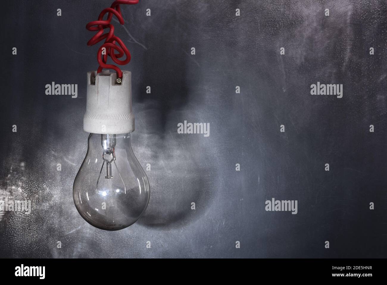 Light bulb on dark background Stock Photo Alamy
