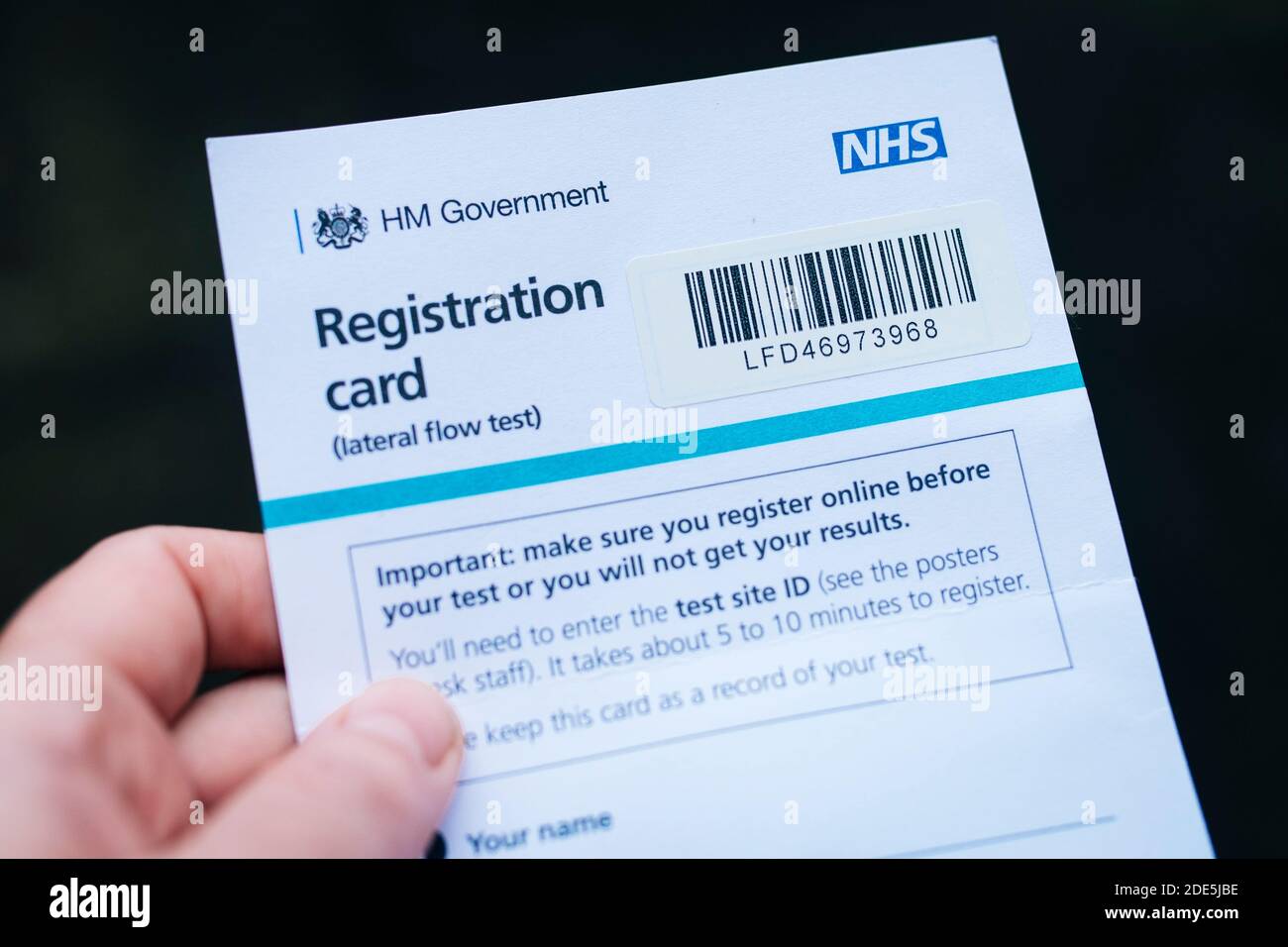 Coronavirus Covid-19 rapid mass testing centre NHS registration card. Lateral flow test. Liverpool mass testing scheme November 2020 Stock Photo