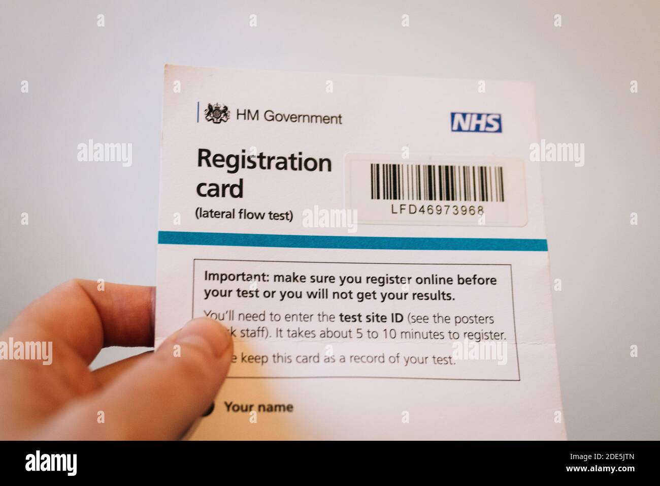 Coronavirus Covid-19 rapid mass testing centre NHS registration card. Lateral flow test. Liverpool mass testing scheme November 2020 Stock Photo