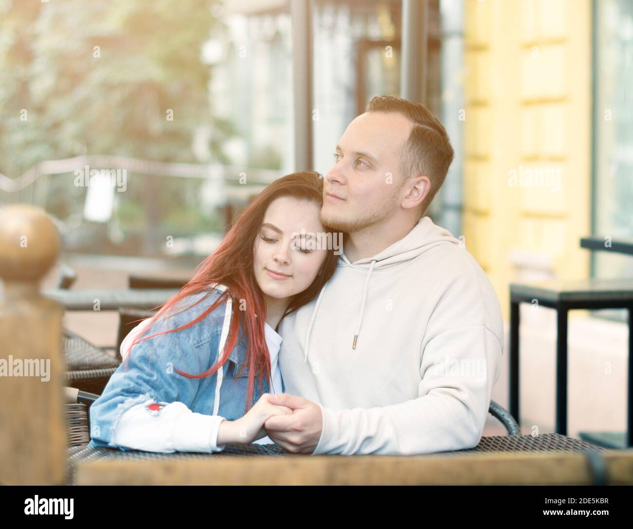Happy young couple caucasian woman and man is sharing smile and walking ...