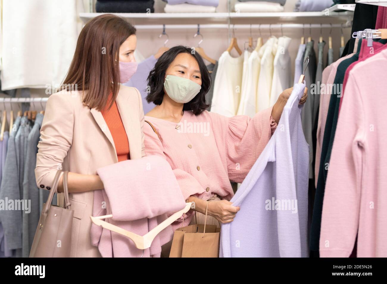 Women in masks hi-res stock photography and images - Alamy