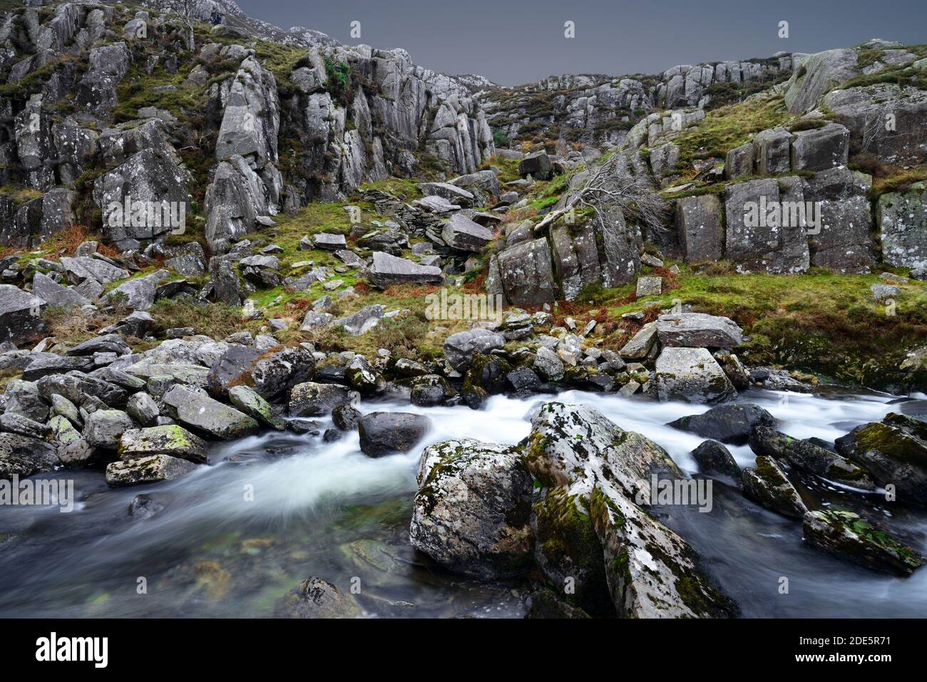 Shown here is the rocky terrain in the Nant Ffrancon valley situated between the Glyderau and the Carneddau mountain ranges in Snowdonia. Stock Photo