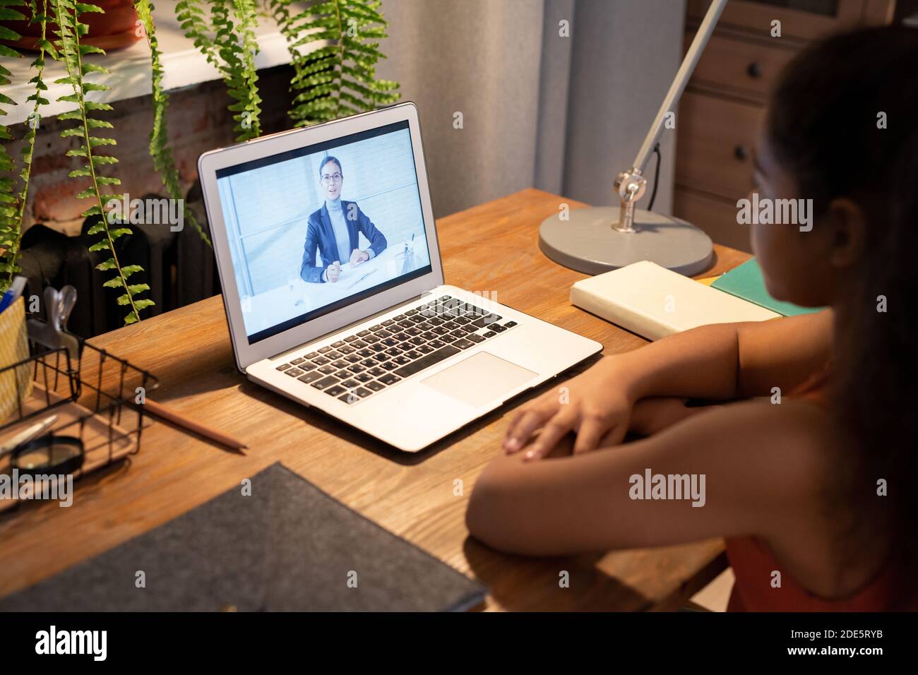 Teacher young schoolgirl using hi-res stock photography and images - Alamy