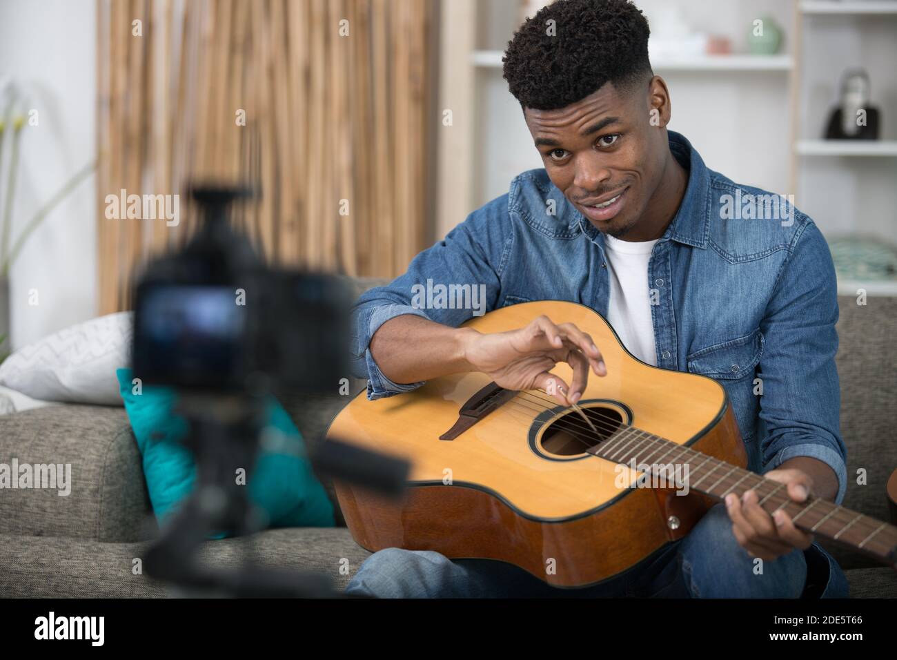 handsome man is recording song Stock Photo