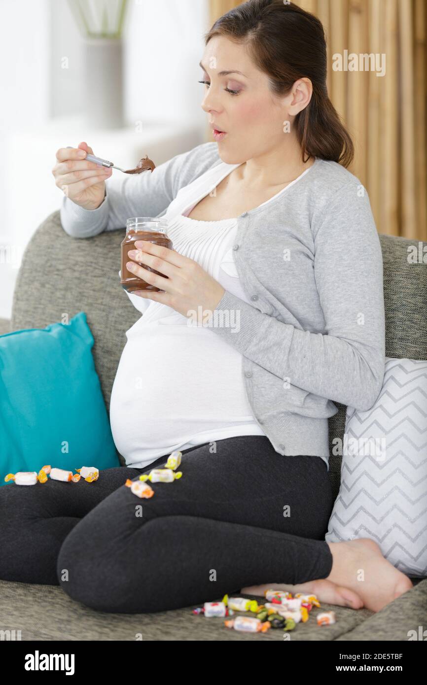 pregnant woman craving for chocolate Stock Photo Alamy