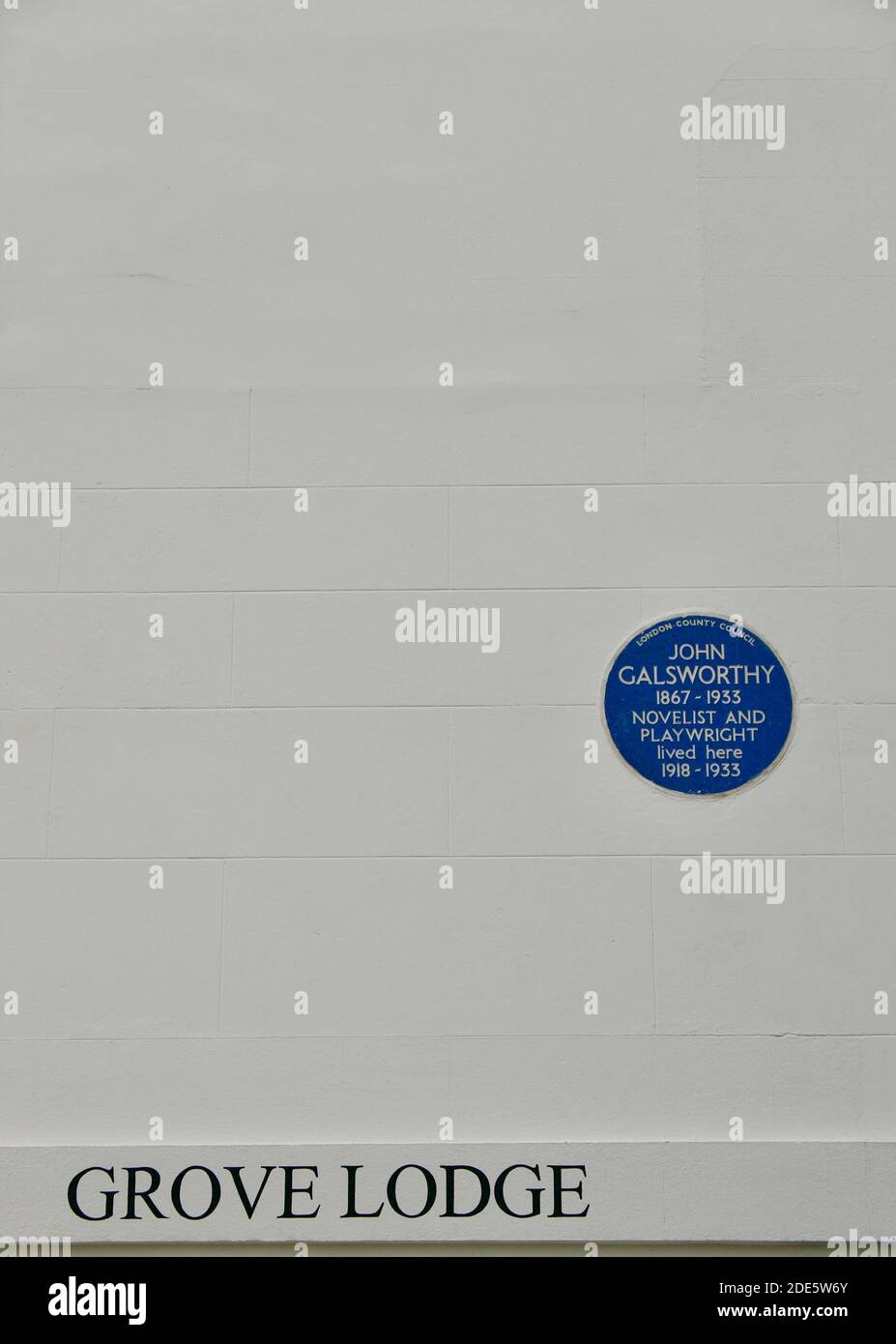 John Galsworthy, playwright and novelist, blue plaque by English Heritage depicting where he lived in Grove Lodge, Hampstead Village, London. Stock Photo