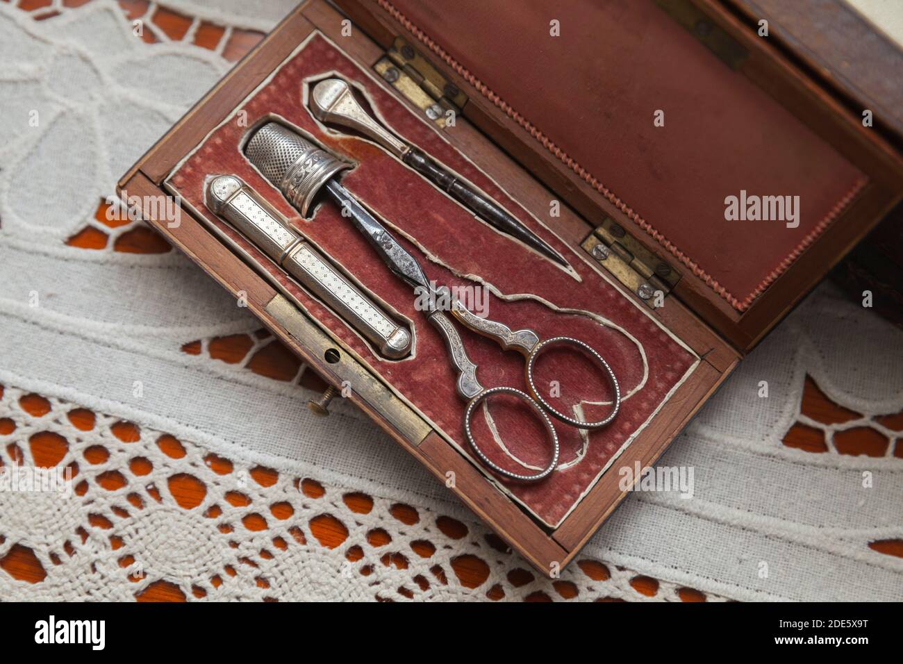Vintage sewing kit with scissors, thimble and awl Stock Photo