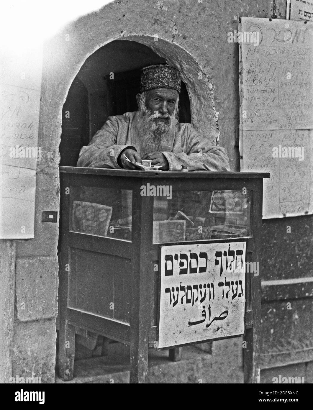Original Caption Money changer Location ca. 19341939 Stock Photo Alamy