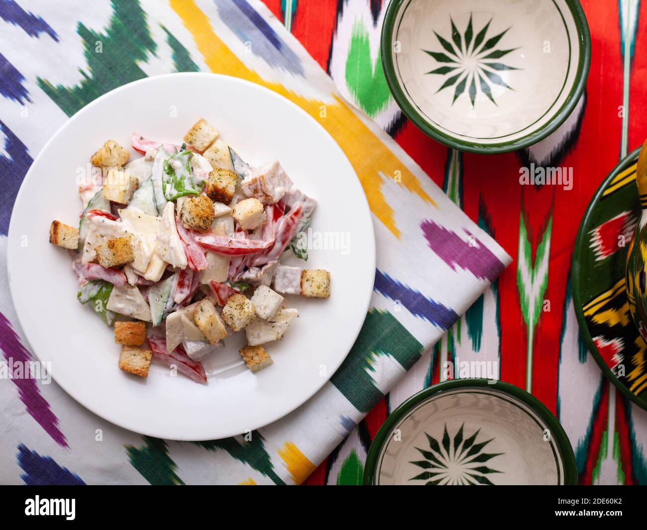 Malibu salad with crab sticks and croutons, feta cheese and vegetables. Asian style Stock Photo