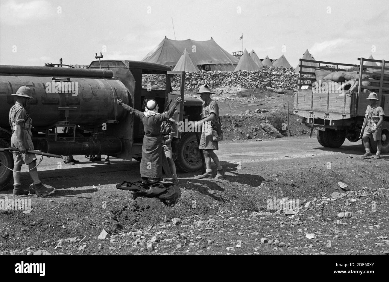 Middle East History - British Military Camp at klm. 41 Lubban-Nablus Rd. Troops of the Black Watch searching Arabs at K. 41 camp Stock Photo