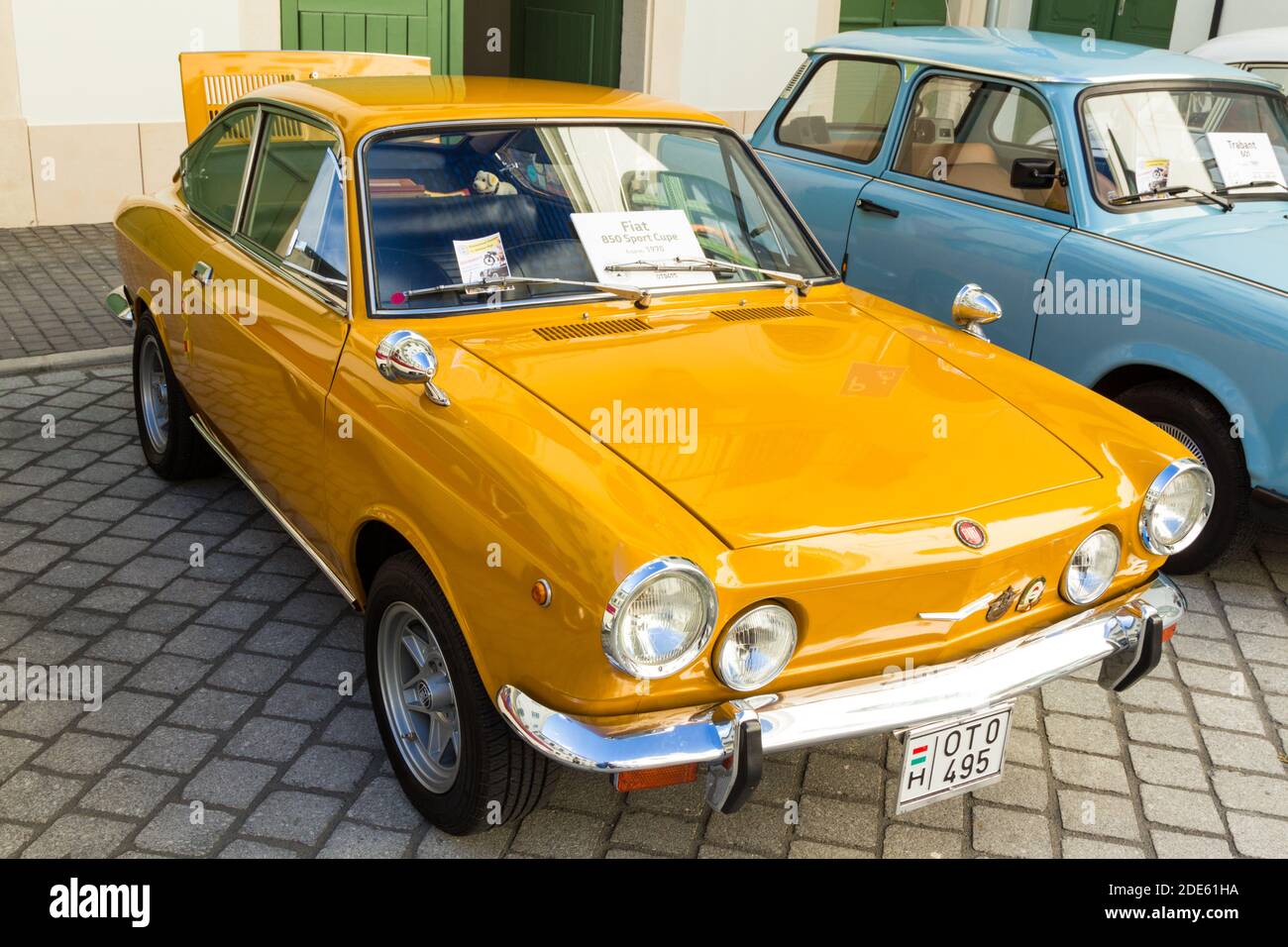Yellow Fiat 850 sport coupe old-timer car on display, Sopron, Hungary Stock Photo