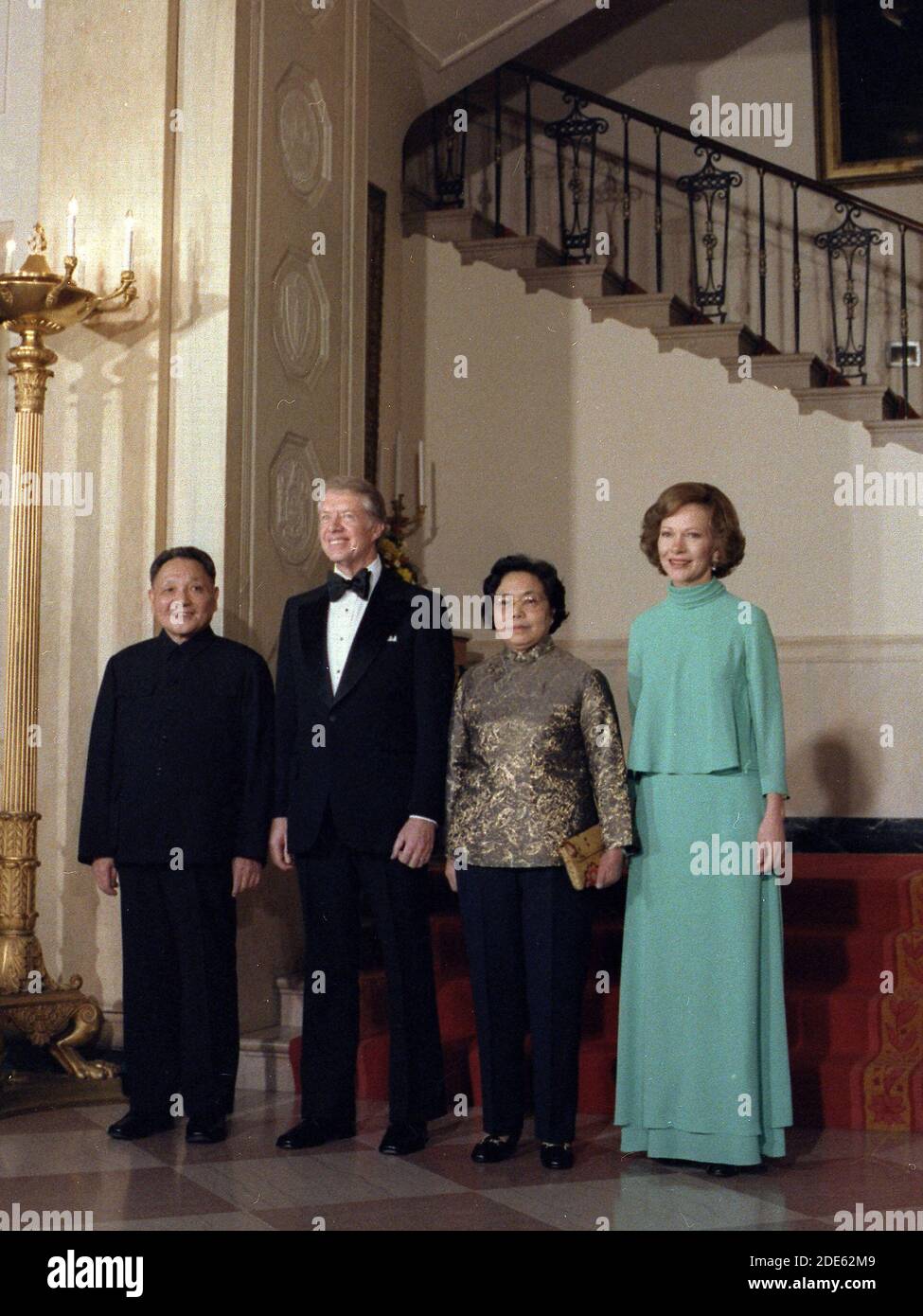 Deng Xiaoping Jimmy Carter Madame Zhuo Lin and Rosalynn Carter pause for a formal pose during the state dinner for the Vice Premier of China. ca.  29 January 1979 Stock Photo