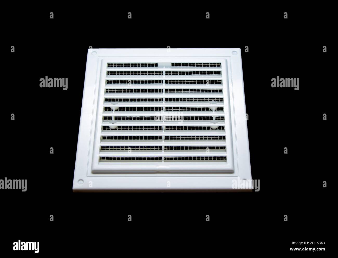 New white square plastic ventilation grille on black background Stock Photo