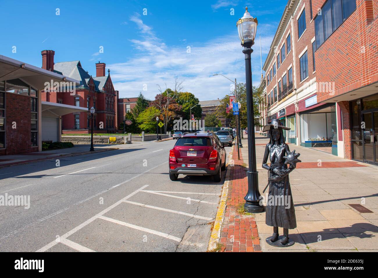 Young woman Statue in front of Fitchburg Public Library at 610 Main Street in downtown Fitchburg, Massachusetts MA, USA. Stock Photo