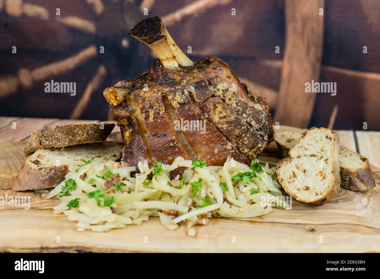 pork knuckle with sauerkraut and bread Stock Photo Alamy