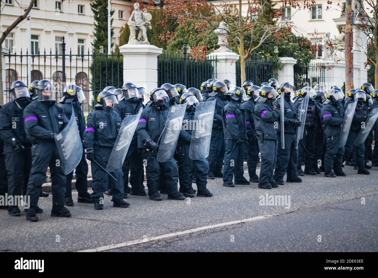 Armed police officers with riot shield on Slovak anti governmental demonstration against corona virus restrictions Stock Photo