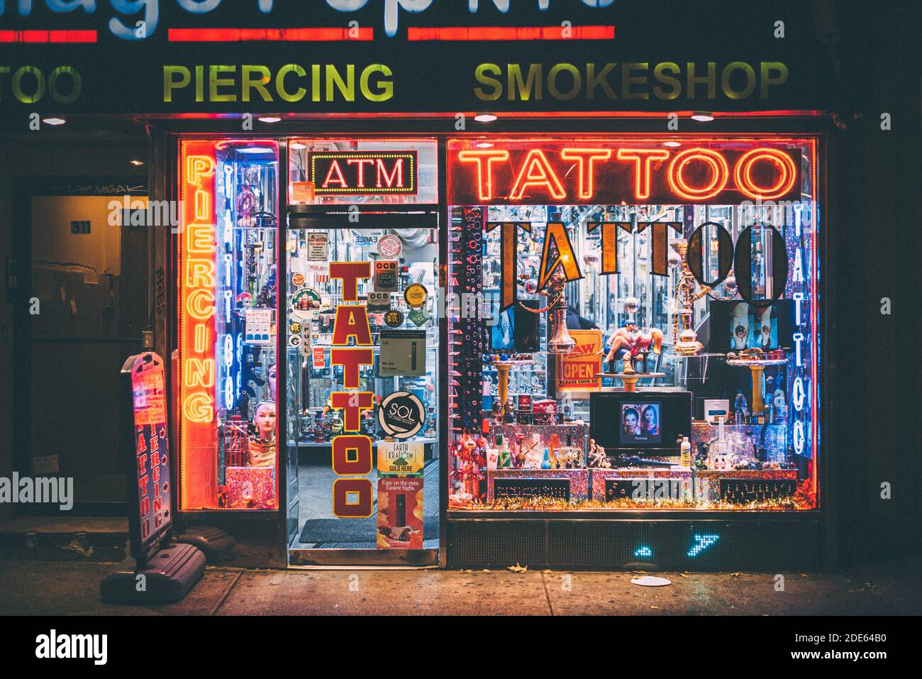 Tattoo shop at night in the West Village, Manhattan, New York City Stock  Photo - Alamy