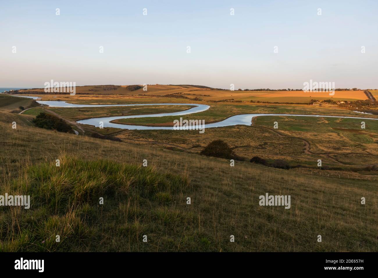 England, East Sussex, Eastbourne, South Downs National Park, Birling Gap, The Cuckmere River  at Sunset Stock Photo
