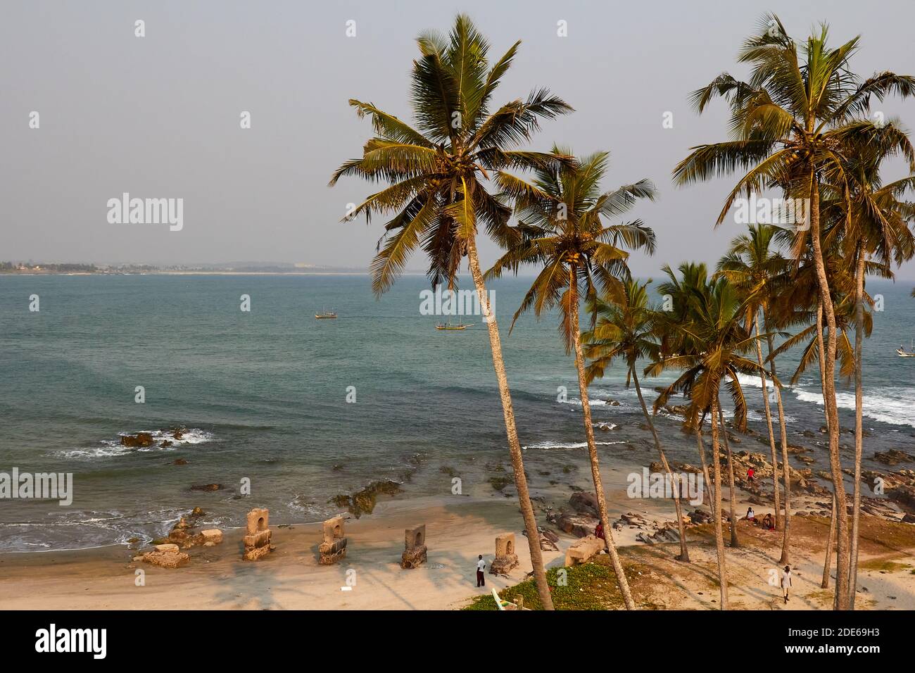 Elmina beach with palm trees, Cape Coast, Ghana Stock Photo