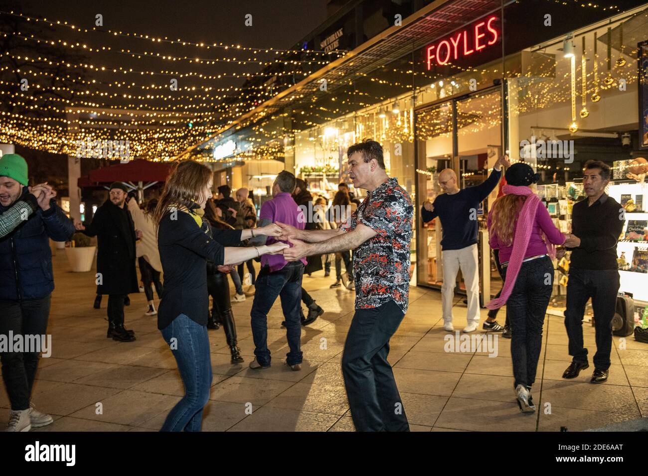 Salsa dancing, social distanced dancing outside the FOYLES bookstore along the Southbank during the coronavirus lockdown#2 restrictions, London, UK Stock Photo