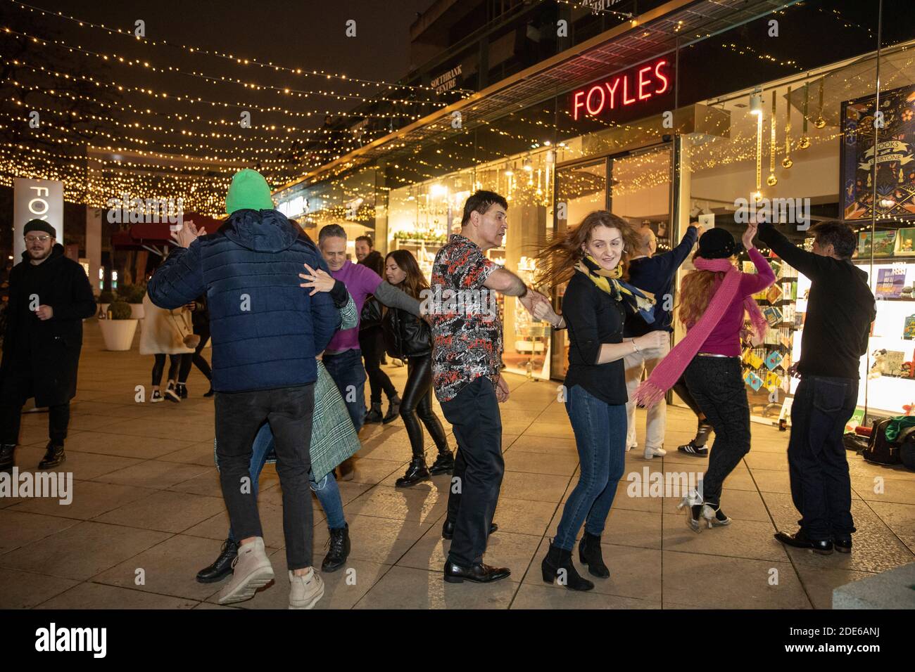 Salsa dancing, social distanced dancing outside the FOYLES bookstore along the Southbank during the coronavirus lockdown#2 restrictions, London, UK Stock Photo