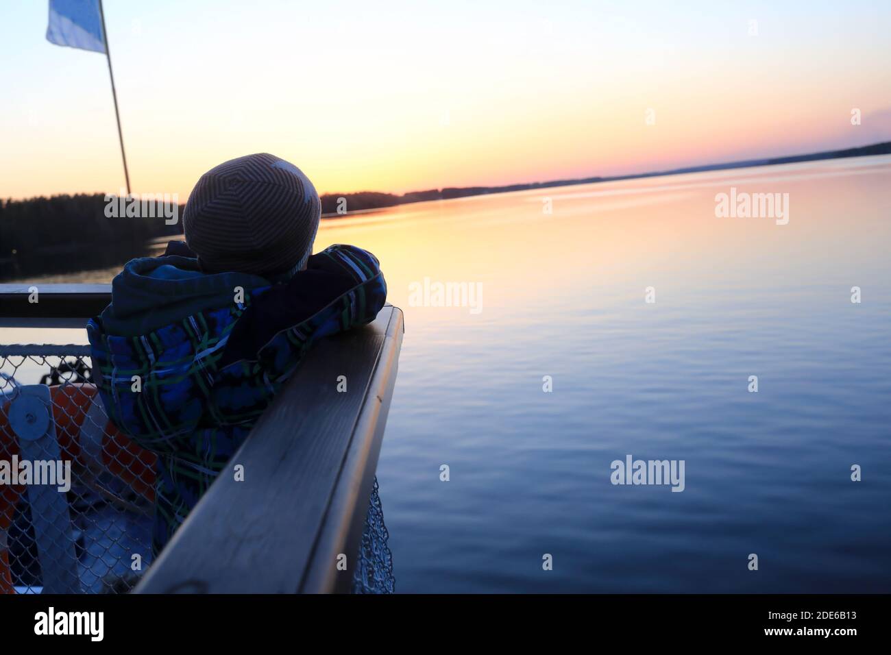Child looking at river Volga from deck of ship Stock Photo