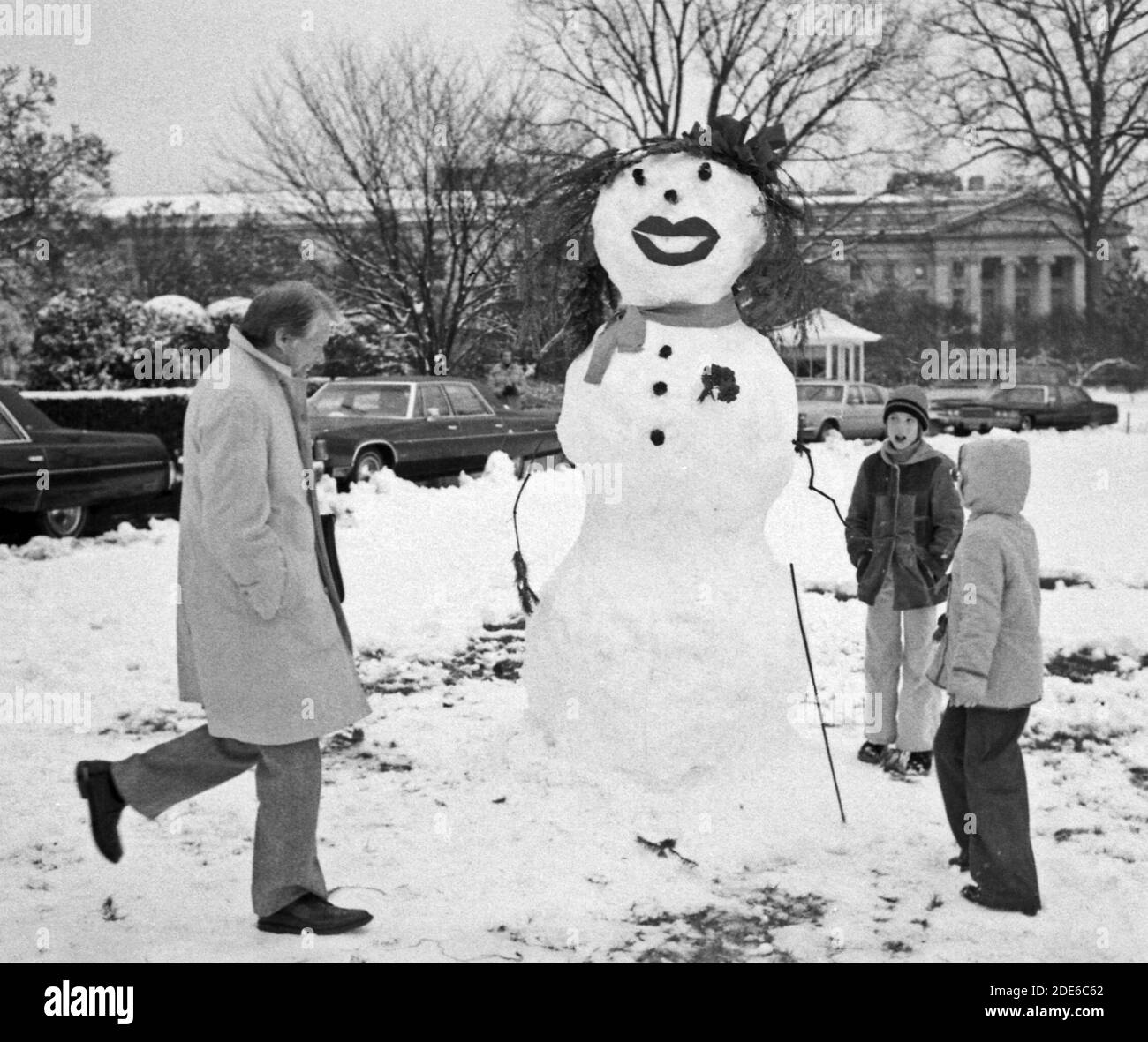 President Carter views snowman built by Amy Carter and her friends. ca.  15 January 1978 Stock Photo