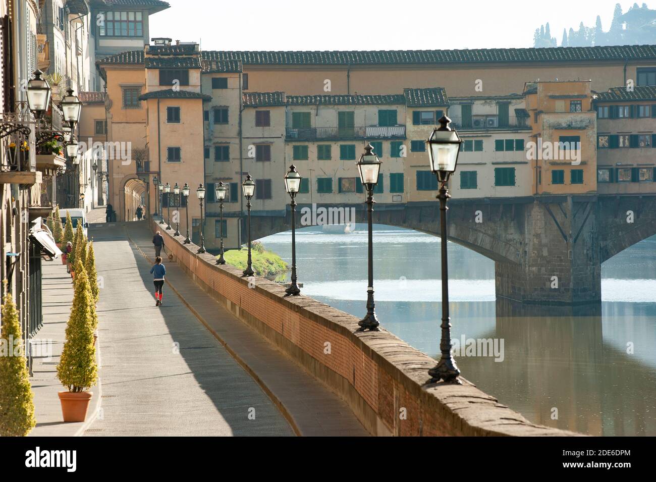 Florence, Italy - 2020, November 19: Very few people on Lungarno, during Covid-19 pandemic lockdown. Stock Photo