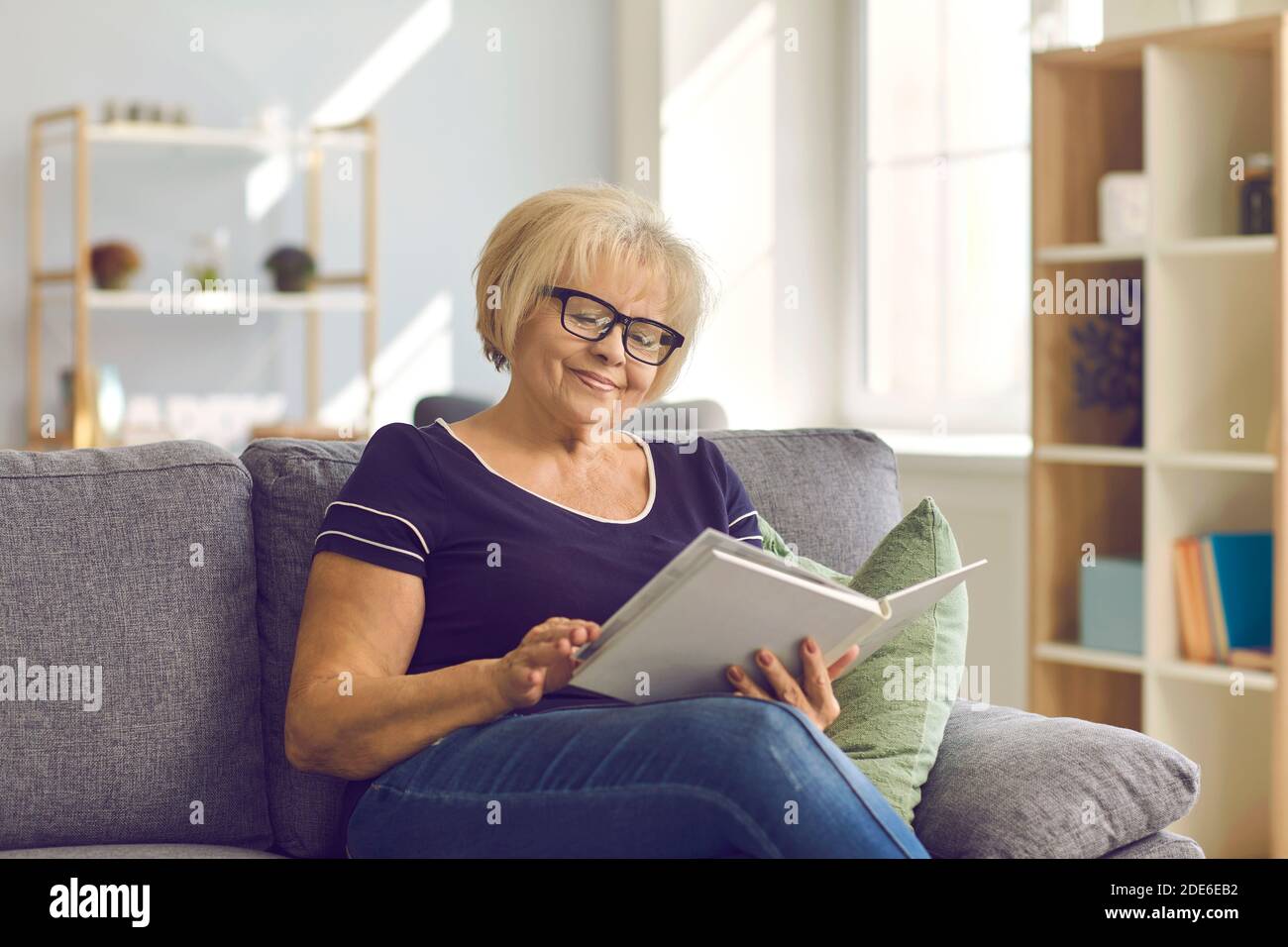 Looking at photo album hi-res stock photography and images - Alamy