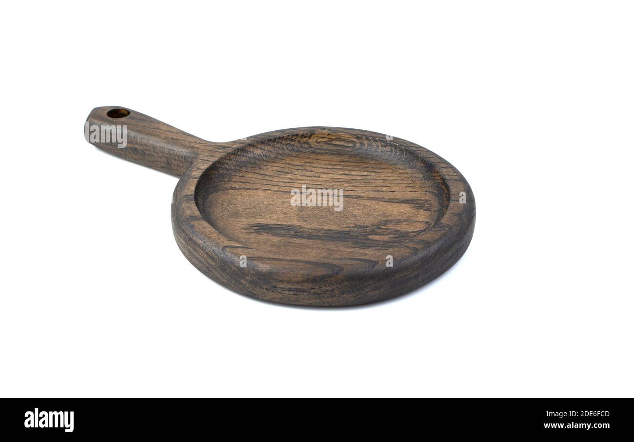Cutting Board with a handle, isolated on a white background. Side view with space for copying. Stock Photo