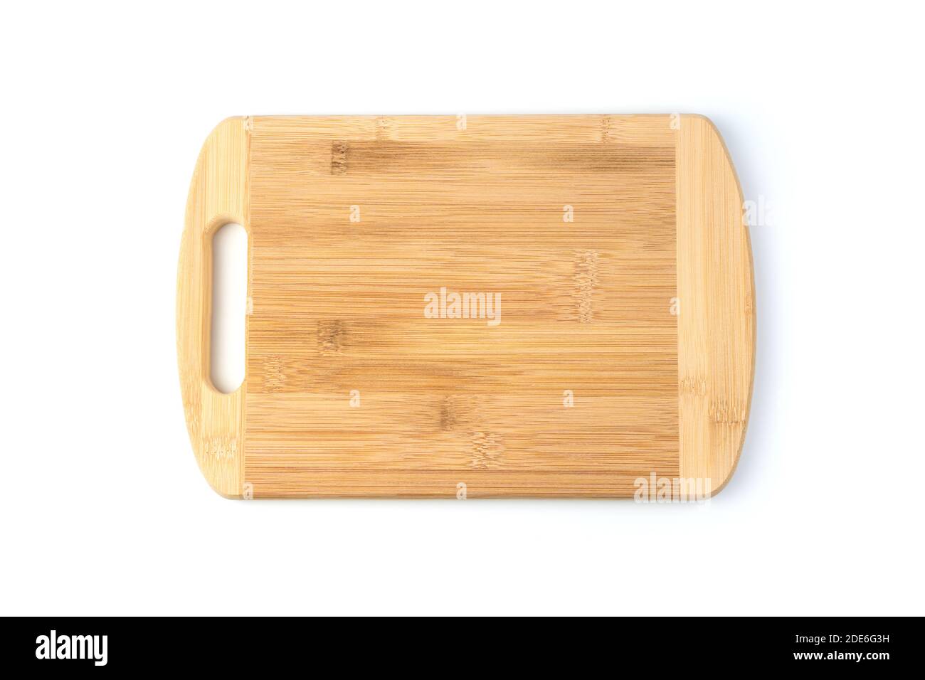 A wooden rectangular cutting Board is isolated on a white background. Stock Photo