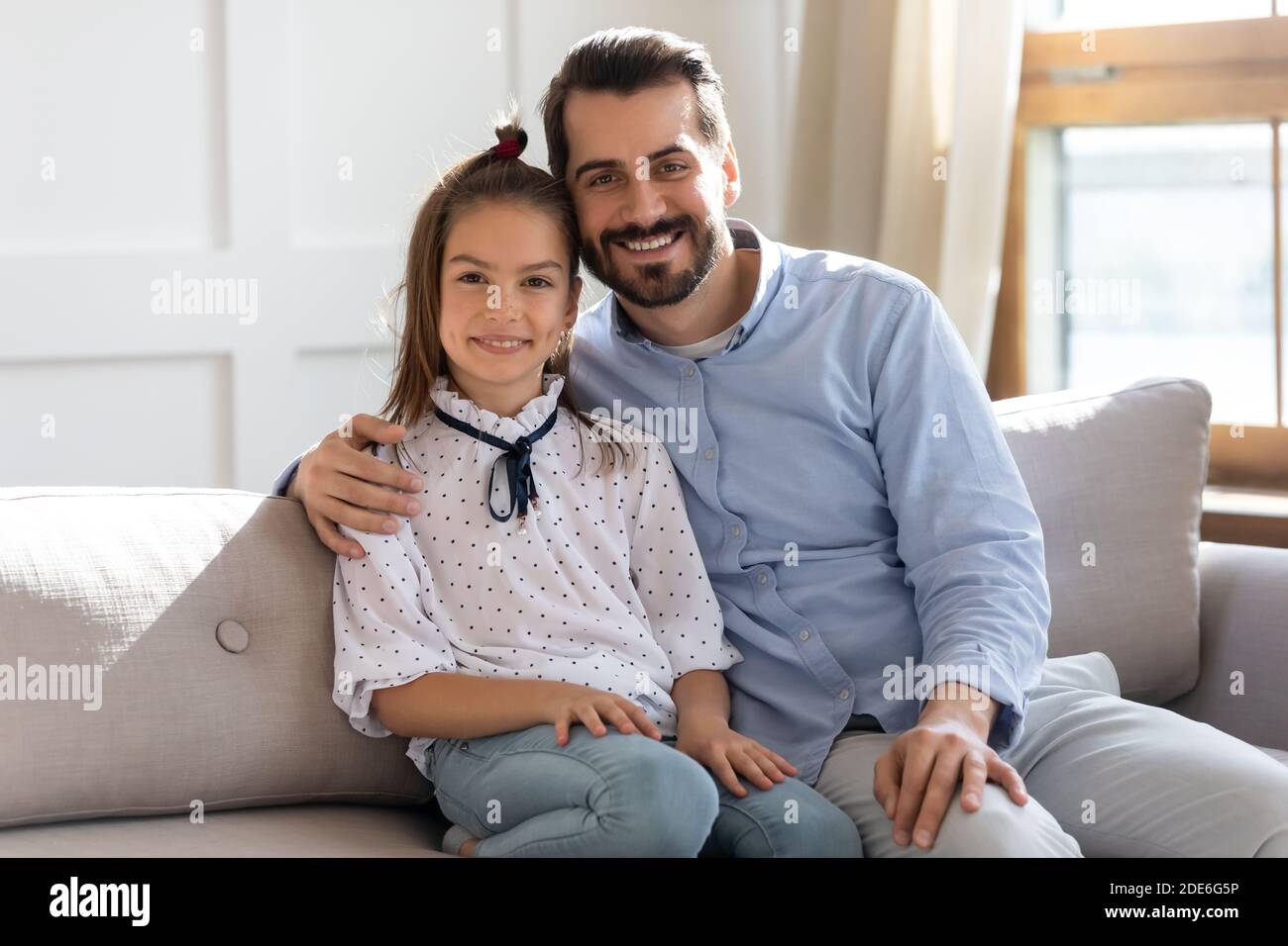 Portrait of loving dad and daughter relax at home Stock Photo