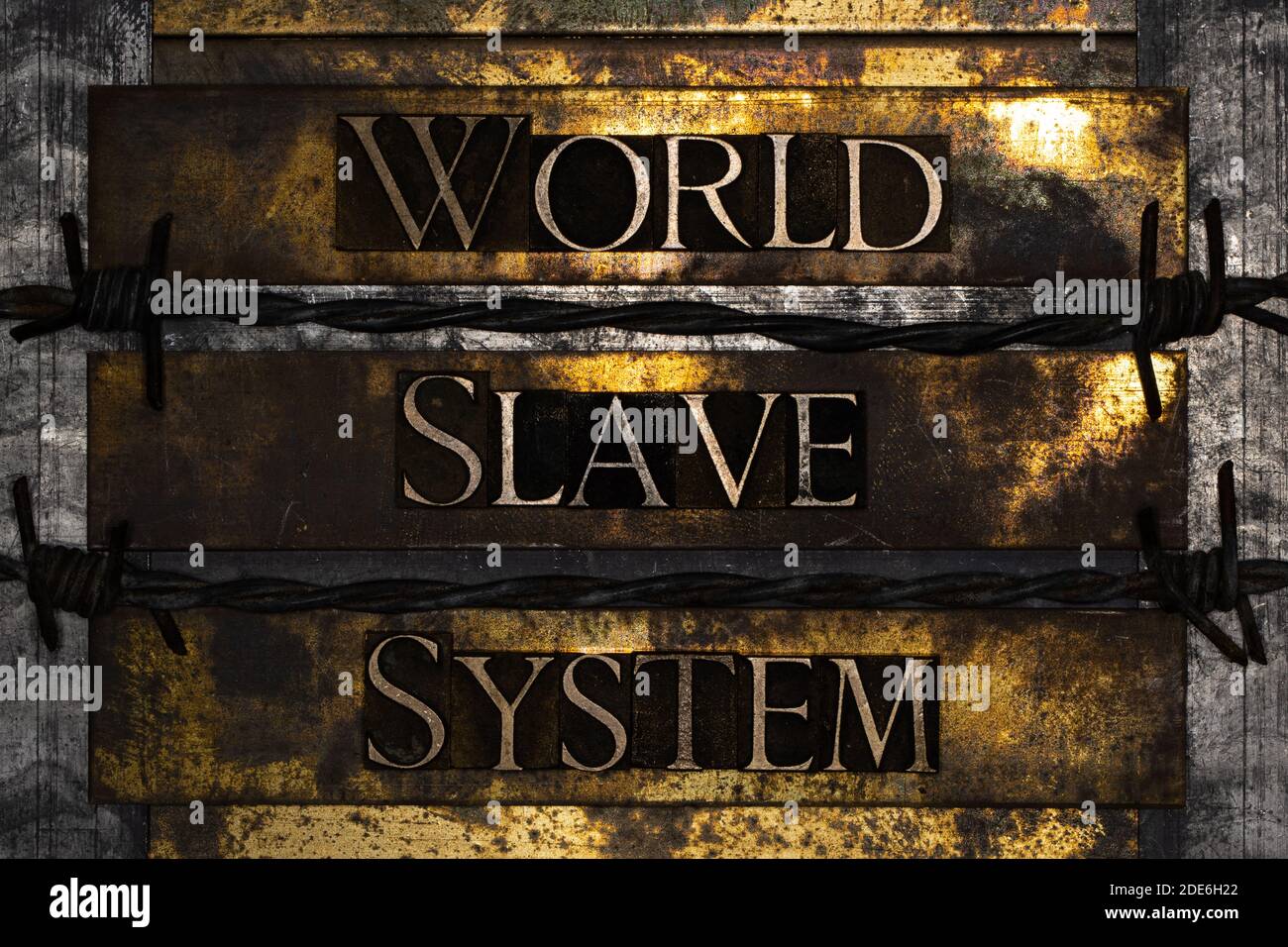World Slave System text on textured grunge copper and vintage gold background Stock Photo