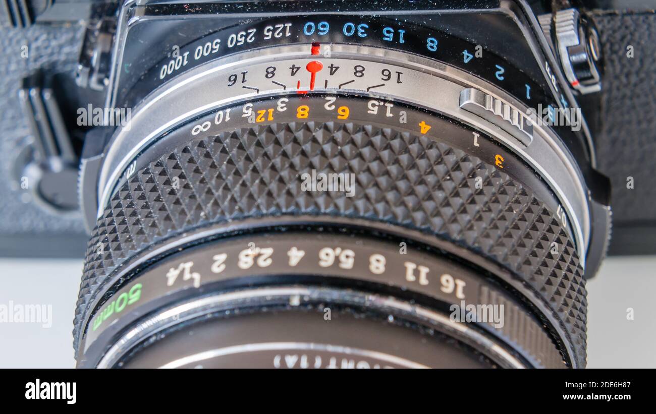 A Retro vintage Olympus OM1 35mm single lens reflex film camera, and