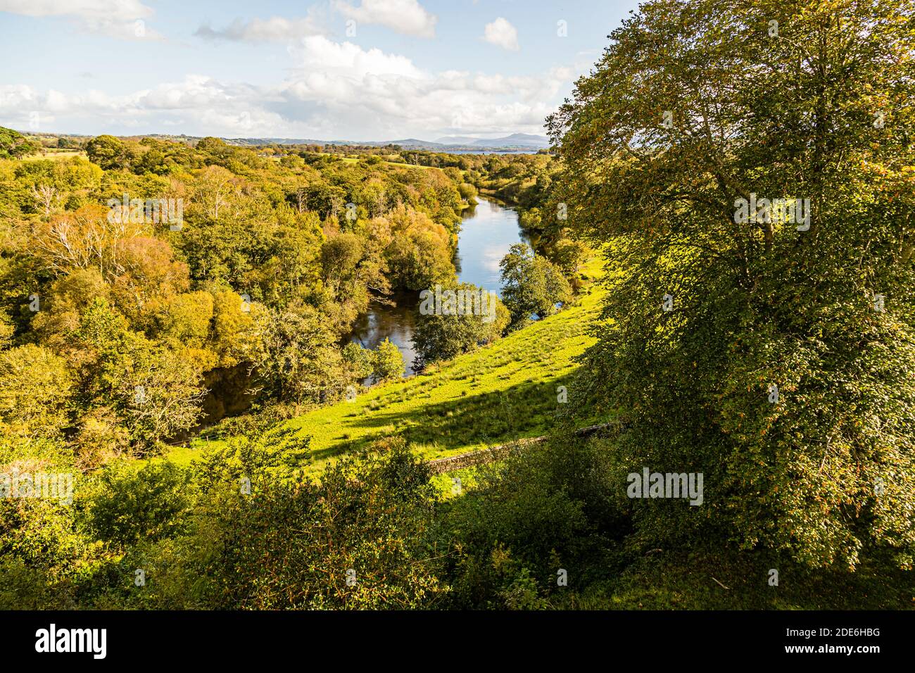 The grounds of the five-star Dunloe Hotel & Gardens extend near Killarney, County Kerry, Ireland, with meadows, woodland and views of the surrounding hills. Stock Photo