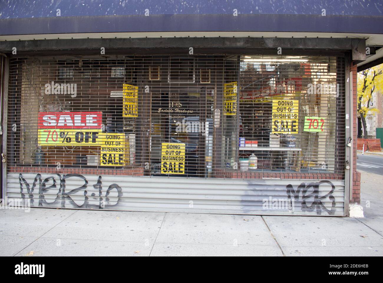 Going Out Of Business Sale 70% Off signs in a store window, November 29, 2020, in New York. Stock Photo